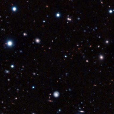 Der Galaxienhaufen CL J1449+0856. (ESO/NOAJ/Subaru/R. Gobat)