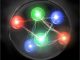 Künstlerische Darstellung eines gebundenen H Dibaryons, theoretisch bestehend aus zwei Up-, zwei Down-, und zwei Strange-Quarks (Copyright 2011, Keiko Murano)