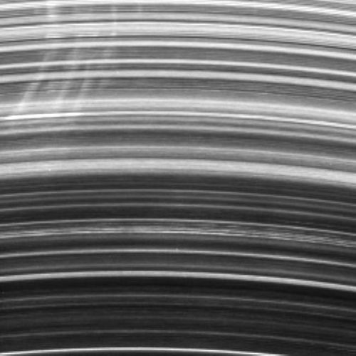 Helle, radial verlaufende Speichen auf dem B-Ring (Courtesy of NASA / JPL / Space Science Institute)