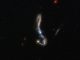 Die Starburst-Galaxie J082354.96+280621.6, aufgenommen vom Weltraumteleskop Hubble. (ESA / Hubble & NASA, M. Hayes)