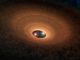 Künstlerische Darstellung der Materiescheibe um die beiden Zentralsterne des Systems YLW 16A. Alle 93 Tage kommt es zu einem Aufblinken des Systems. (NASA / JPL-Caltech)