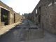 Ein Teil der antiken Stadt Pompeji, die im Jahr 79 nach Christus durch den Ausbruch des Vesuv zerstört wurde. (Image courtesy of Lauren Hackworth Petersen)