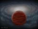Das Bild zeigt die künstlerische Darstellung eines Braunen Zwergs aus der dicken Scheibe oder dem Halo. Die Scheibe der Milchstraßen-Galaxie ist im Hintergrund zu sehen. Obwohl Braune Zwerge in der Nähe des Sonnensystems beobachtet werden, sind viele weit von dem am dichtesten bevölkerten Teil der Galaxie entfernt. (John Pinfield)