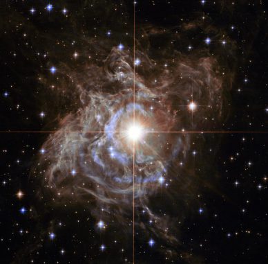 Hubble-Aufnahme der Lichtechos um RS Puppis, einem veränderlichen Stern der Cepheiden-Klasse. (NASA, ESA, and the Hubble Heritage Team (STScI / AURA) - Hubble / Europe Collaboration; Acknowledgment: H. Bond (STScI and Penn State University))