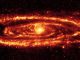 Infrarotaufnahme der Andromeda-Galaxie M31. Das Bild basiert auf Daten des Weltraumteleskops Spitzer und lässt komplexe Staubstrukturen innerhalb der riesigen Galaxie erkennen. (NASA / JPL-Caltech / Univ. of Ariz.)