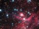 Der Sternhaufen LH63 innerhalb des Emissionsnebels LHA 120-N 51 in der Großen Magellanschen Wolke, aufgenommen vom Weltraumteleskop Hubble. (NASA, ESA, and D. Gouliermis (University of Heidelberg); Acknowledgement: Luca Limatola)