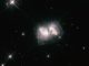 Der präplanetarische Nebel Roberts 22 (AFGL 4104), aufgenommen vom Weltraumteleskop Hubble. (NASA, ESA, and R. Sahai (Jet Propulsion Laboratory))