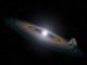 Künstlerische Darstellung von Gesteinstrümmern in Umlaufbahnen um einen Weißen Zwerg. (NASA, ESA, STScI, and G. Bacon (STScI))