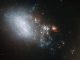 Die irreguläre Galaxie NGC 4485 ist Teil des Galaxienpaares Arp 269 und liegt im Sternbild Jagdhunde. (ESA / Hubble & NASA; Acknowledgement: Kathy van Pelt)