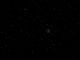 Der Komet 67P/Churyumov-Gerasimenko (im roten Kreis) am 4. Juni 2014, aufgenommen vom Onboard Scientific Imaging System der Raumsonde Rosetta. (ESA / Rosetta / MPS / UPD / LAM / IAA / SSO / INTA / UPM / DASP / IDA)