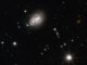 Das stark interagierende Galaxienpaar 2MASX J06094582-2140234, aufgenommen vom Weltraumteleskop Hubble. (ESA / Hubble &