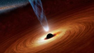 Die Region um ein supermassives Schwarzes Loch leuchtet hell im Röntgenbereich. Ein Teil dieser Strahlung stammt aus einer umgebenden Akkretionsscheibe, der Großteil stammt von der Korona, die auf dieser künstlerischen Illustration als das weiße Licht an der Basis des Jets dargestellt ist. Dies ist eine von mehreren vorhergesagten Formen der Korona. (NASA / JPL-Caltech)