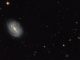 Die Spiralgalaxie PGC 54493, aufgenommen vom Weltraumteleskop Hubble. (ESA / Hubble & NASA; Acknowledgement: Judy Schmidt (geckzilla.com))