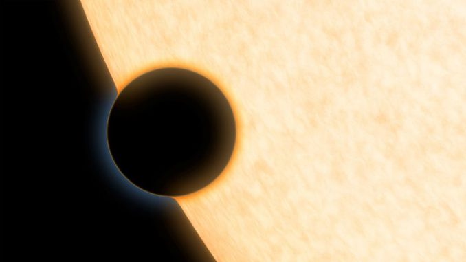 Diese Illustration zeigt die Silhouette des Exoplaneten HAT-P-11b vor seinem Zentralstern. Der Exoplanet wurde bei einem Transit beobachtet, um mehr über seine Atmosphäre zu erfahren. (NASA / JPL-Caltech)