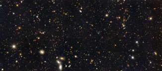 Hubble-Aufnahme von entfernten Galaxien im GOODS-South-Feld. Astronomen haben herausgefunden, dass die Sternentstehungsrate eine Milliarde Jahre nach dem Urknall bedeutend höher war als heute. (NASA / HST / GOODS Team)