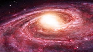 Künstlerische Darstellung der Milchstraßen-Galaxie. Ihr heißer Halo scheint den sternbildenden, atomaren Wasserstoff aus ihren begleitenden, sphäroiden Zwerggalaxien wegzufegen. (NRAO / AUI / NSF)