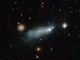 Die blaue, kompakte Zwerggalaxie SBSG 1415+437, aufgenommen vom Weltraumteleskop Hubble. (ESA / Hubble & NASA; Acknowledgement: Alessandra Aloisi (STScI) and Nick Rose)