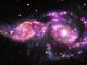 Die beiden Galaxien NGC 2207 und IC 2163, basierend auf Daten der Weltraumteleskope Chandra, Hubble und Spitzer. (NASA / CXC / SAO / STScI / JPL-Caltech)