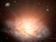 Künstlerische Illustration des neuen Rekordhalters für die hellste Galaxie im Universum. (NASA / JPL-Caltech)