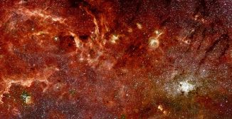 Mosaik-Aufnahme des galaktischen Zentrums, basierend auf Daten der Weltraumteleskope Hubble und Spitzer. (NASA / ESA)