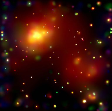Chandra-Aufnahme des Galaxienhaufens Abell 2125 mit seinen Galaxien und sehr heißen Gaswolken, die sich in einem Verschmelzungsprozess befinden. Einer neuen Studie zufolge spielt die Umgebung eine wichtige Rolle bei der Materieakkretion der Schwarzen Löcher in den Galaxien. (NASA / CXC / UMASS / Q. D. Wang et al.)