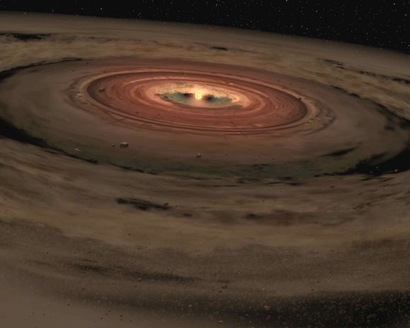 Künstlerische Darstellung einer Staubscheibe um einen Stern. Trümmer können entweder auf die Entstehung oder Zerstörung großer Himmelskörper hinweisen. (NASA / JPL-Caltech)