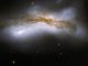 Hubble-Aufnahme des Galaxienpaares NGC 520 im Sternbild Fische. (NASA, ESA, the Hubble Heritage Team (STScI / AURA) - ESA / Hubble Collaboration, and B. Whitmore (STScI))
