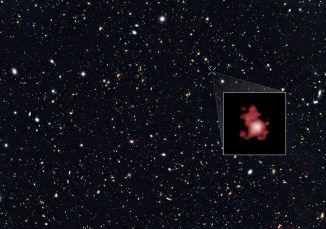 Die große Aufnahme zeigt die Position der fernen Galaxie GN-z11 (kleines Bild). (NASA, ESA, and P. Oesch (Yale University))