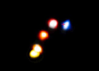 Dieses Bild veranschaulicht die Bewegung der Gaswolke G2 um das supermassive Schwarze Loch im Zentrum der Milchstraßen-Galaxie. (ESO / A. Eckart)