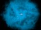 Künstlerische Darstellung der Milchstraßen-Galaxie und ihrer kleinen Begleiter innerhalb des riesigen Halos aus Millionen Grad heißem Gas, das nur für Röntgenteleskope sichtbar ist. Einer neuen Studie zufolge ist der Halo nicht stationär, sondern rotiert in die gleiche Richtung wie die galaktische Scheibe. (NASA / CXC / M.Weiss / Ohio State / A Gupta et al.)