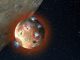 Illustration der Atmosphäre von Io, während sie bei einer Finsternis kollabiert. (Image Courtesy of Southwest Research Institute)