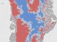 Neue Karte des Grönländischen Eisschildes. Sie zeigt, ob der Boden des Eisschildes wahrscheinlich getaut (rot) oder wahrscheinlich gefroren (blau) ist. Unsichere Gebiete sind grau markiert. (NASA Earth Observatory / Jesse Allen)