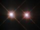 Das Sternsystem mit Alpha Centauri A und B (links und rechts) und dem hier nicht sichtbaren Zwergstern Proxima Centauri ist das erdnächste Sternsystem. (ESA / Hubble & NASA)