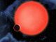 Künstlerische Darstellung des Exoplaneten GJ1214b und seinem Zentralstern (NASA, ESA, and D. Aguilar (Harvard-Smithsonian Center for Astrophysics))
