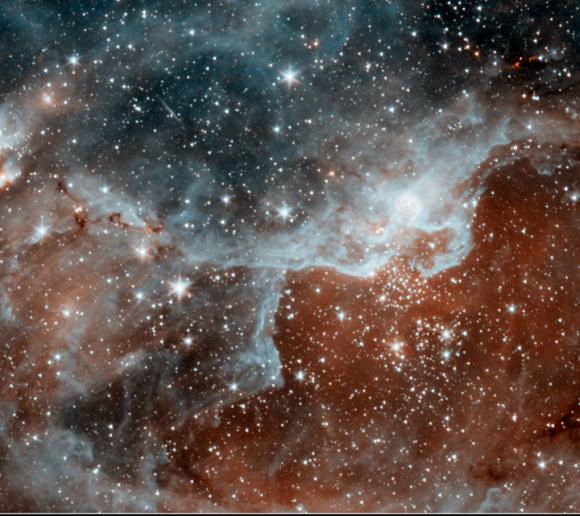 Ein junger Sternhaufen (NASA / JPL-Caltech)