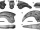 Fossile Knochen des Spinosauriden Suchomimus. Linke Seite (A, E, G), Proximal (B), rechte Seite (C) und ventrale Ansichten (D, F, H). Der schwarze Balken entspricht einer Länge von 5 Zentimetern. (Monash University / Dr. Tom Rich)