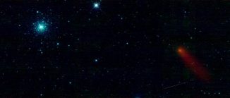 Der Kugelsternhaufen Messier 3 (M3) und der Komet C/2008 Q3 (Garradd), aufgenommen vom Infrarotteleskop WISE. (NASA / JPL-Caltech / UCLA)