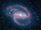 Infrarotansicht der Spiralgalaxie NGC 1097, aufgenommen vom Weltraumteleskop Spitzer. (NASA / JPL-Caltech / The SINGS Team (SSC / Caltech))