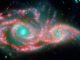 Die verschmelzenden Galaxien NGC 2207 und IC 2163, basierend auf Daten der Weltraumteleskope Spitzer und Hubble. (NASA, ESA / JPL-Caltech / STScI / D. Elmegreen (Vassar))