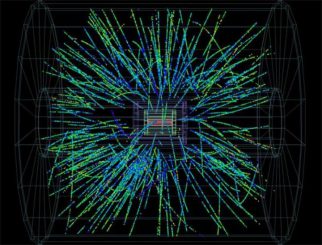 Ein Proton kollidiert mit einem Bleikern, wodurch ein Teilchenschauer auf den ALICE-Detektor niedergeht. (ALICE / CERN)