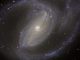 Die Balkenspiralgalaxie NGC 1097, aufgenommen vom Very Large Telescope der Europäischen Südsternwarte. (ESO)