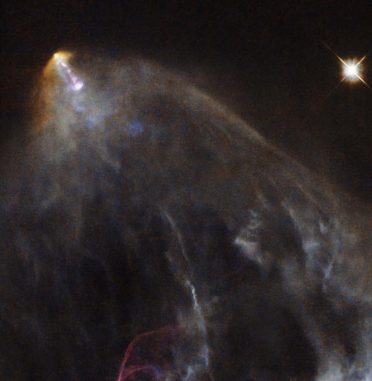 Das Herbig-Haro-Objekt HH 151, aufgenommen vom Weltraumteleskop Hubble. (ESA / Hubble & NASA. Acknowledgement: Gilles Chapdelaine)