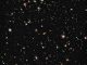 Hubble-Aufnahme eines fernen Galaxienfeldes. (NASA, ESA, G. Illingworth (UCO / Lick & UCSC), R. Bouwens (UCO / Lick & Leiden U.), and the HUDF09 Team)