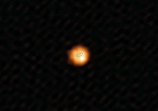 Der Rote Riese W Hydrae, basierend auf Daten des ALMA-Teleskops in Submillimeter-Wellenlängen. Die gestrichelte Ellipse stellt die Größe der Erdumlaufbahn um die Sonne dar.(Credit: Alma (ESO / NAOJ / NRAO) / W. Vlemmings)