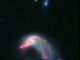 Arp 142, basierend auf Daten der Weltraumteleskope Spitzer und Hubble. (Credit: NASA-ESA / STScI / AURA / JPL-Caltech)