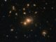 Hubble-Aufnahme des Galaxienhaufens SDSS J1152+3313. (Credits: ESA / Hubble & NASA; Acknowledgement: Judy Schmidt (Geckzilla))
