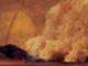 Künstlerische Darstellung eines Staubsturms auf dem Saturnmond Titan. (Credits: IPGP / Labex UnivEarthS / University Paris Diderot – C. Epitalon & S. Rodriguez)