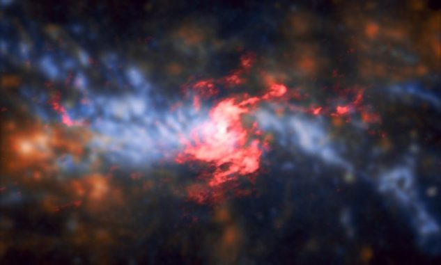Falschfarbenbild der Zentralregion von NGC 5643, basierend auf ALMA-Daten. Im Kern sind eine Akkretionsscheibe und ein Torus aus Gas und Staub erkennbar. (Credits: ESO / A. Alonso-Herrero et al.; ALMA (ESO / NAOJ / NRAO) Falschfarbenbild der Zentralregion von NGC 5643, basierend auf ALMA-Daten. Im Kern sind eine Akkretionsscheibe und ein Torus aus Gas und Staub erkennbar. (Credits: ESO / A. Alonso-Herrero et al.; ALMA (ESO / NAOJ / NRAO)