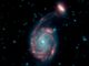 Das verschmelzende Galaxienpaar Arp 86, bestehend aus NGC 7752 (Mitte) und NGC 7753 (oben rechts). (Credits: NASA / JPL-Caltech)