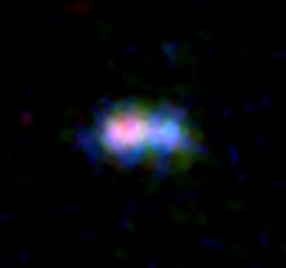Die ferne Galaxie MACS0416_Y1, basierend auf Daten des Weltraumteleskops Hubble und ALMA. Die Verteilung von Staub und Sauerstoffgas ist in rot und grün gekennzeichnet. Die Verteilung der Sterne ist grün dargestellt. (Credit: ALMA (ESO / NAOJ / NRAO), NASA / ESA Hubble Space Telescope, Tamura et al.)